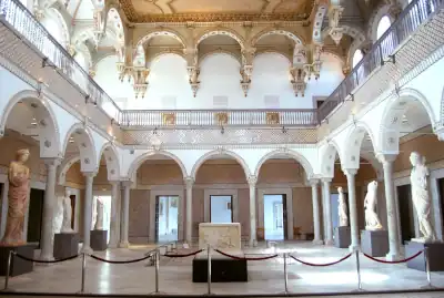 Interior atrium of the Bardo National Museum in Tunis, showcasing Roman mosaics and historic architecture
